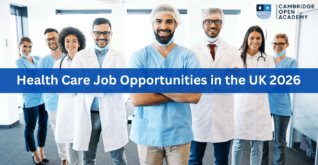 The image showcases a diverse group of healthcare professionals standing confidently in a modern medical facility. The team includes individuals wearing blue scrubs, white lab coats, and surgical caps, suggesting a variety of roles such as nurses, doctors, and surgeons. The background features a clean, well-lit environment with large windows, enhancing the professional atmosphere. The Cambridge Open Academy logo in the top right corner indicates an educational or training initiative related to healthcare careers. The bold blue text at the bottom highlights the focus on job opportunities in the UK for the year 2026.